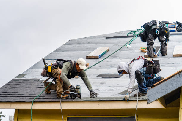 Professional Roofing technician working in Orange, CT
